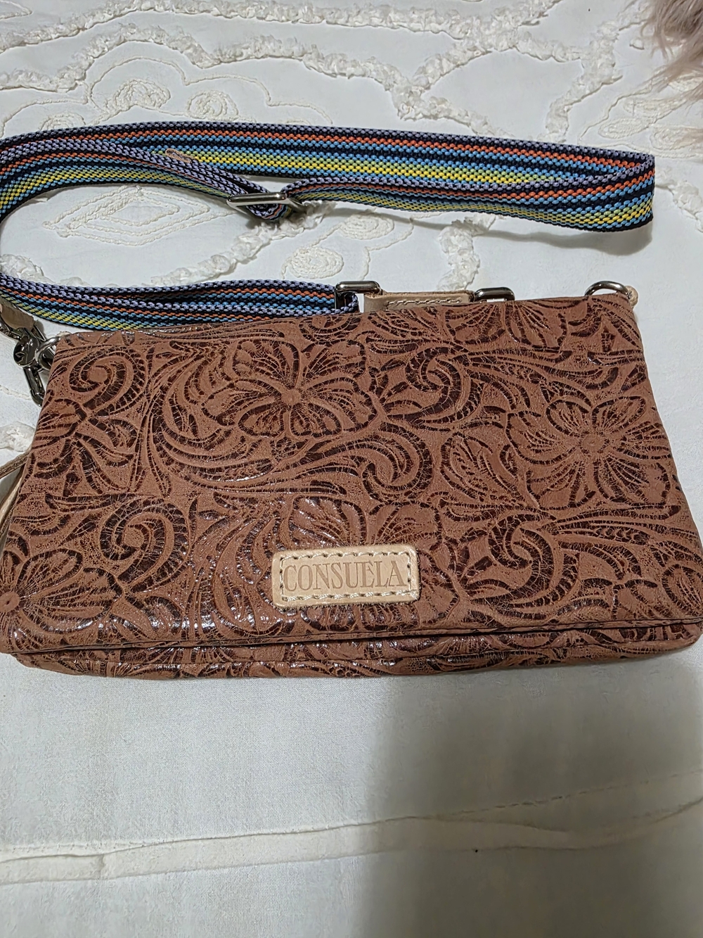 Consuela Floral Embossed Crossbody Bag in Brown
